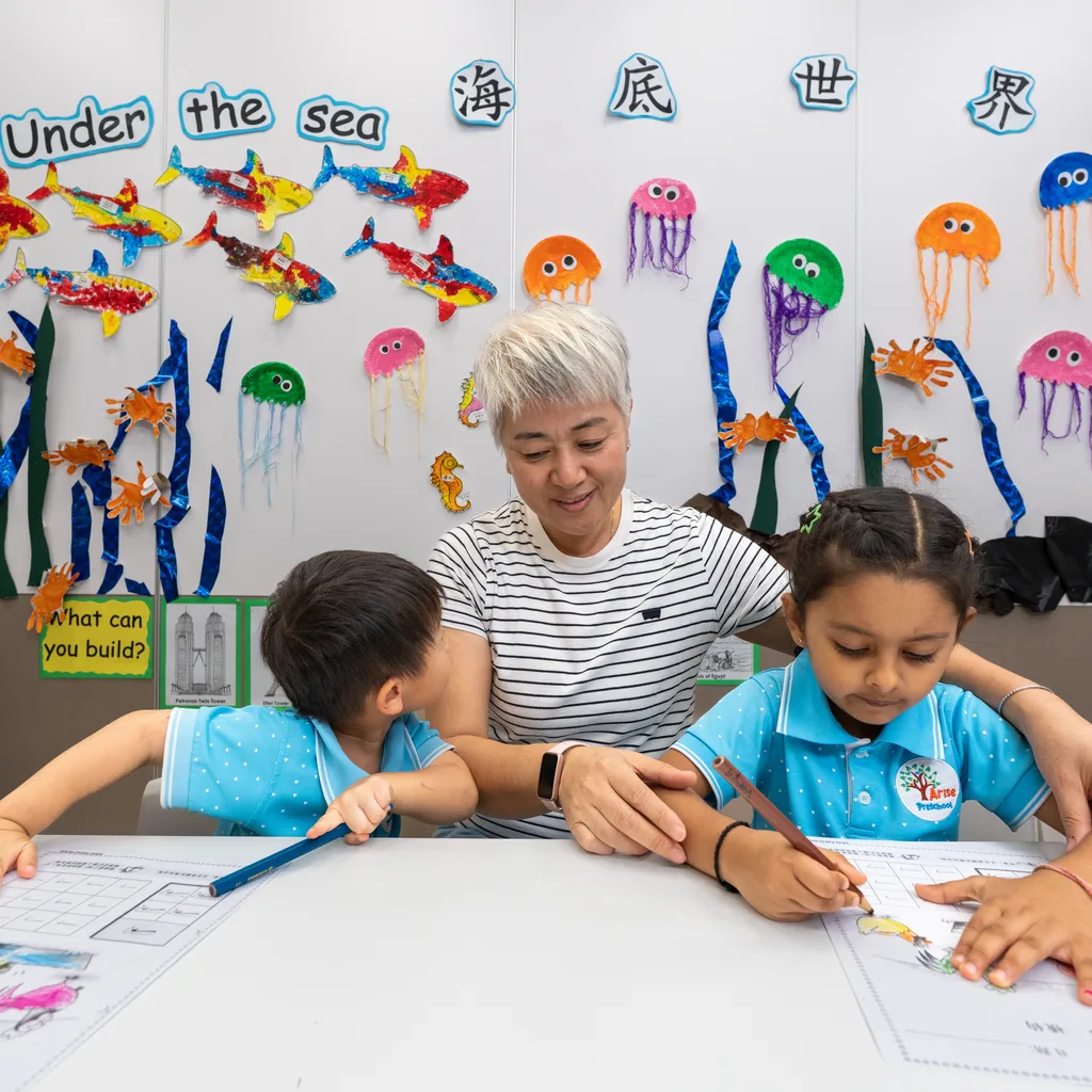 A teacher and child at Arise