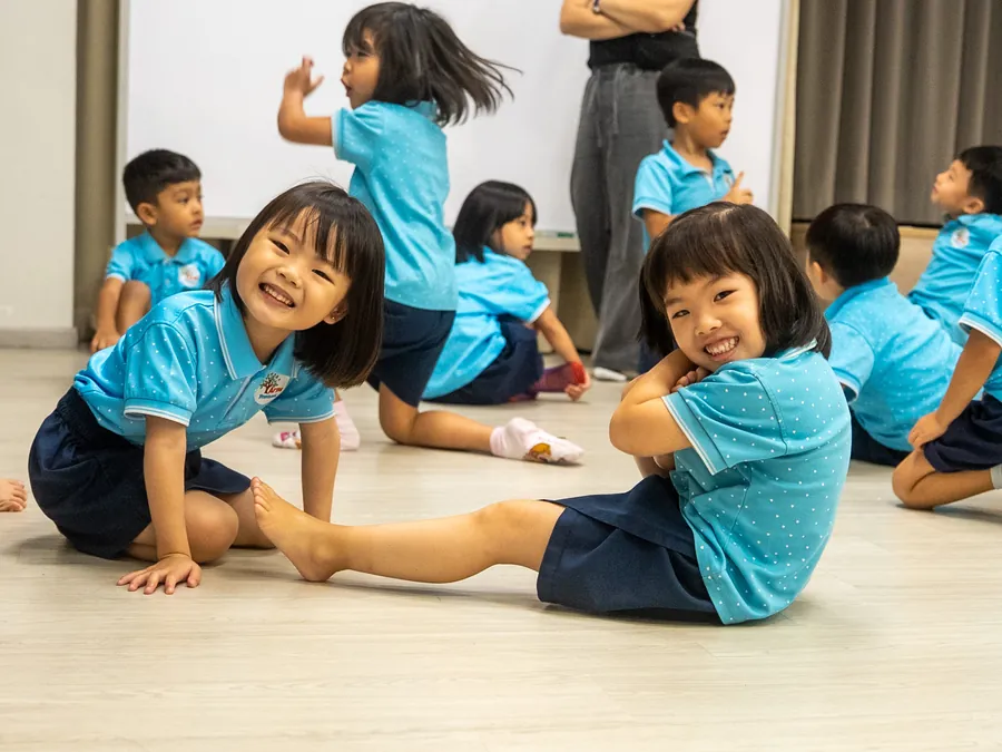 Children moving and playing in the hall