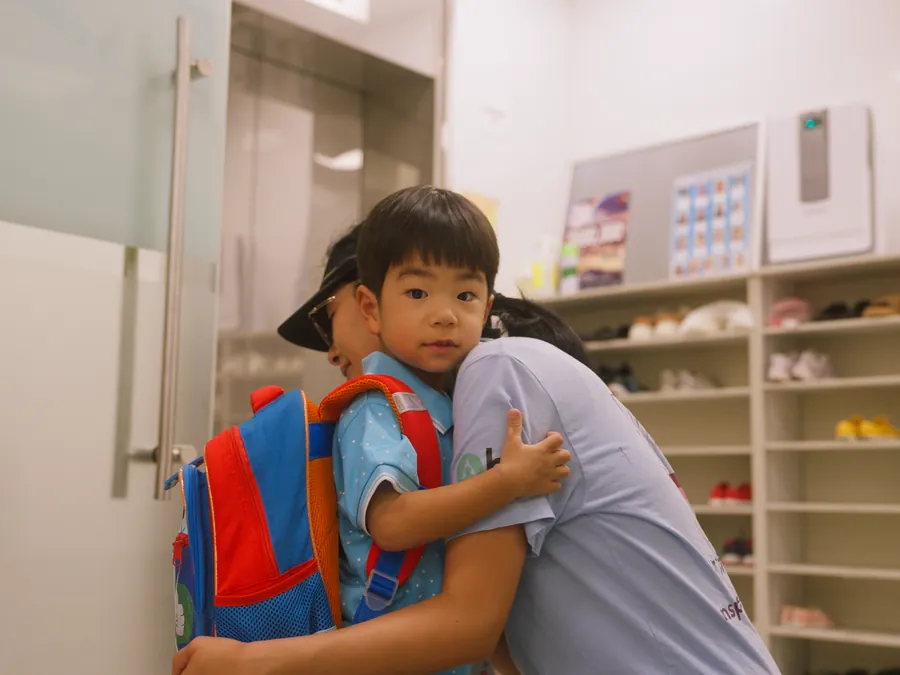 A goodbye hug at drop-off